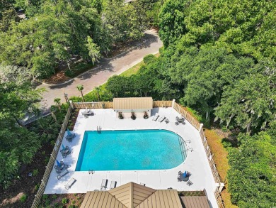 Welcome to 423 Chapman Loop, a lovely traditional home located on Willbrook Plantation Golf Club in South Carolina - for sale on GolfHomes.com, golf home, golf lot