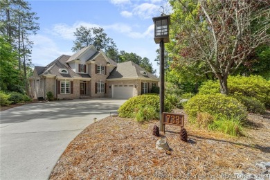 This custom executive home is not just a residence; it's a on Carolina Trace Country Club in North Carolina - for sale on GolfHomes.com, golf home, golf lot