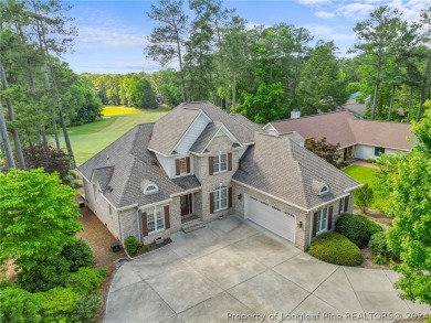 This custom executive home is not just a residence; it's a on Carolina Trace Country Club in North Carolina - for sale on GolfHomes.com, golf home, golf lot