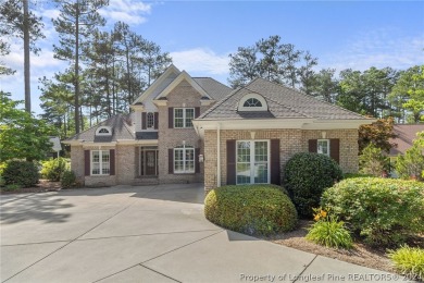 This custom executive home is not just a residence; it's a on Carolina Trace Country Club in North Carolina - for sale on GolfHomes.com, golf home, golf lot