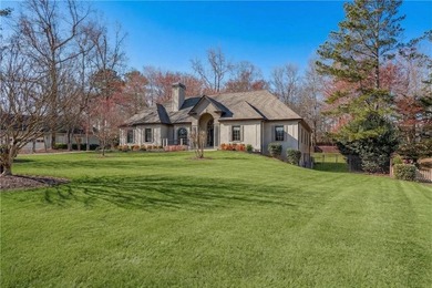 Resort-style living awaits in this beautifully appointed on Royal Lakes Golf and Country Club in Georgia - for sale on GolfHomes.com, golf home, golf lot