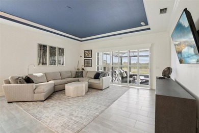 This better-than-new, 2-bedroom plus den/office, 2.5-bath on Sarasota National Golf Club in Florida - for sale on GolfHomes.com, golf home, golf lot