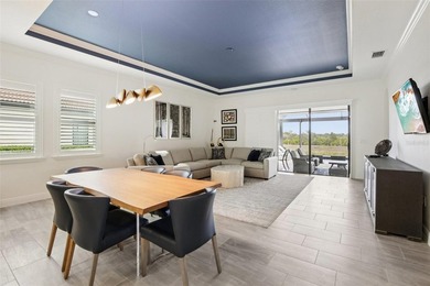 This better-than-new, 2-bedroom plus den/office, 2.5-bath on Sarasota National Golf Club in Florida - for sale on GolfHomes.com, golf home, golf lot