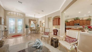 This beautiful custom built home set behind the gates of on Palm Aire Country Club of Sarasota in Florida - for sale on GolfHomes.com, golf home, golf lot