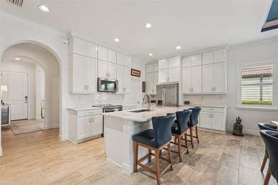 This better-than-new, 2-bedroom plus den/office, 2.5-bath on Sarasota National Golf Club in Florida - for sale on GolfHomes.com, golf home, golf lot