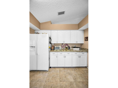 IN TIMBER GREENS A 55+ GATED GOLF COMMUNITY, this 2 Bedroom 2 on Timber Greens Country Club in Florida - for sale on GolfHomes.com, golf home, golf lot