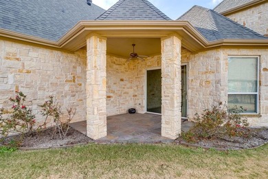 Beautifully designed 2-bedroom, 2.5-bath townhome in The on Harbor Lakes Golf Club in Texas - for sale on GolfHomes.com, golf home, golf lot