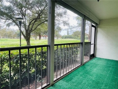 Beautifully updated 1st floor (ground floor) unit overlooking on Inverrary Country Club in Florida - for sale on GolfHomes.com, golf home, golf lot