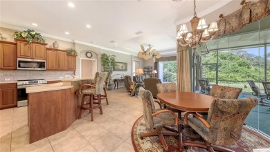This beautiful custom built home set behind the gates of on Palm Aire Country Club of Sarasota in Florida - for sale on GolfHomes.com, golf home, golf lot