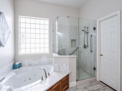 RARE FIND! Gorgeous home in GUARD GATED GOLF COMMUNITY and set on Heritage Lakes - Par 3 - 9 Hole Course in Texas - for sale on GolfHomes.com, golf home, golf lot