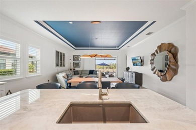 This better-than-new, 2-bedroom plus den/office, 2.5-bath on Sarasota National Golf Club in Florida - for sale on GolfHomes.com, golf home, golf lot