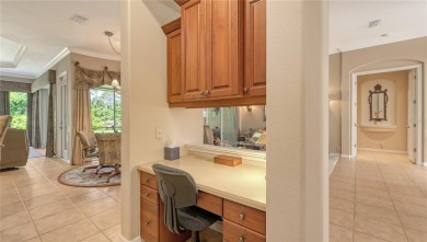 This beautiful custom built home set behind the gates of on Palm Aire Country Club of Sarasota in Florida - for sale on GolfHomes.com, golf home, golf lot