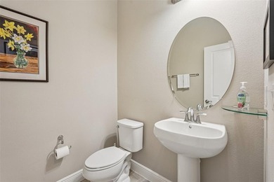 This better-than-new, 2-bedroom plus den/office, 2.5-bath on Sarasota National Golf Club in Florida - for sale on GolfHomes.com, golf home, golf lot