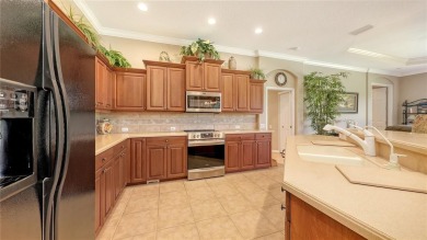 This beautiful custom built home set behind the gates of on Palm Aire Country Club of Sarasota in Florida - for sale on GolfHomes.com, golf home, golf lot