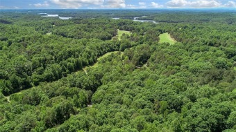 This is a nice building lot on Chickasaw golf course, wooded on The Trail At Chickasaw Pointe in South Carolina - for sale on GolfHomes.com, golf home, golf lot