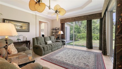 This beautiful custom built home set behind the gates of on Palm Aire Country Club of Sarasota in Florida - for sale on GolfHomes.com, golf home, golf lot