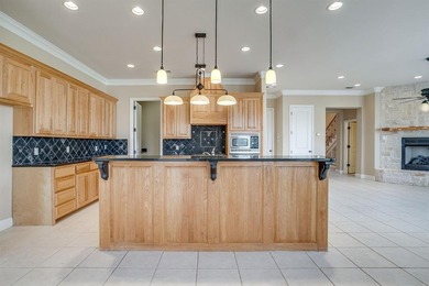 Beautifully designed 2-bedroom, 2.5-bath townhome in The on Harbor Lakes Golf Club in Texas - for sale on GolfHomes.com, golf home, golf lot