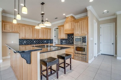 Beautifully designed 2-bedroom, 2.5-bath townhome in The on Harbor Lakes Golf Club in Texas - for sale on GolfHomes.com, golf home, golf lot