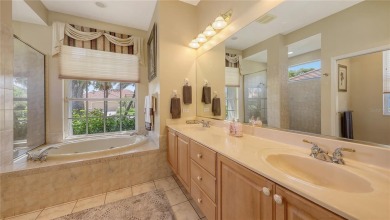 This beautiful custom built home set behind the gates of on Palm Aire Country Club of Sarasota in Florida - for sale on GolfHomes.com, golf home, golf lot