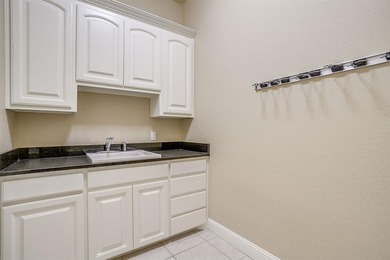 Beautifully designed 2-bedroom, 2.5-bath townhome in The on Harbor Lakes Golf Club in Texas - for sale on GolfHomes.com, golf home, golf lot