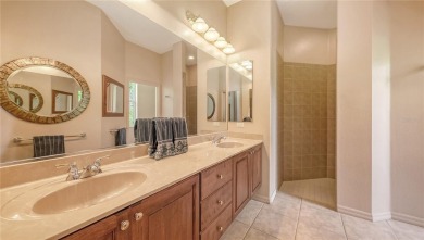 This beautiful custom built home set behind the gates of on Palm Aire Country Club of Sarasota in Florida - for sale on GolfHomes.com, golf home, golf lot