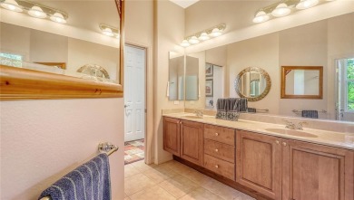 This beautiful custom built home set behind the gates of on Palm Aire Country Club of Sarasota in Florida - for sale on GolfHomes.com, golf home, golf lot