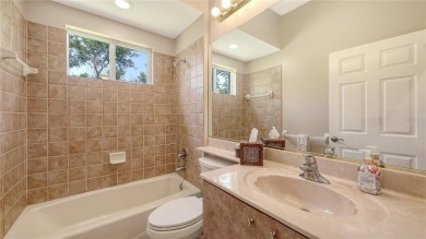 This beautiful custom built home set behind the gates of on Palm Aire Country Club of Sarasota in Florida - for sale on GolfHomes.com, golf home, golf lot