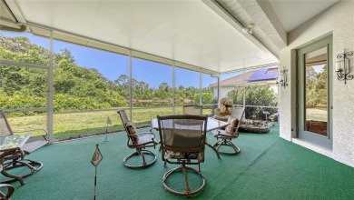 This beautiful custom built home set behind the gates of on Palm Aire Country Club of Sarasota in Florida - for sale on GolfHomes.com, golf home, golf lot