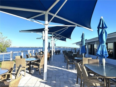 Light, bright, and BEAUTIFULLY UPDATED - this FIRST FLOOR END on The Landings Yacht, Golf and Tennis Club in Florida - for sale on GolfHomes.com, golf home, golf lot