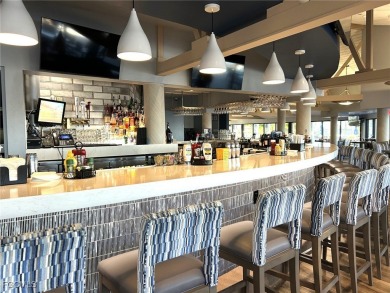 Light, bright, and BEAUTIFULLY UPDATED - this FIRST FLOOR END on The Landings Yacht, Golf and Tennis Club in Florida - for sale on GolfHomes.com, golf home, golf lot