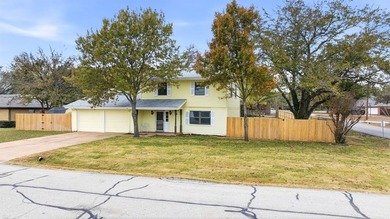 Welcome to 5600 Choctaw Drive, a beautifully updated on De Cordova Bend Country Club in Texas - for sale on GolfHomes.com, golf home, golf lot