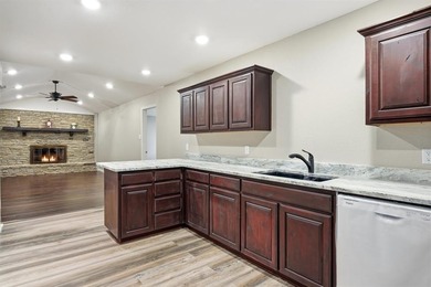 Welcome to 5600 Choctaw Drive, a beautifully updated on De Cordova Bend Country Club in Texas - for sale on GolfHomes.com, golf home, golf lot