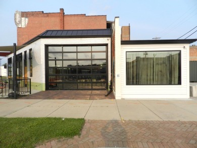 Location! Location! Location! Prime commercial building located on Harbour Shores Golf Course in Michigan - for sale on GolfHomes.com, golf home, golf lot