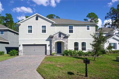 Welcome to this stunning home with Conservation Views in the on Deer Island Country Club in Florida - for sale on GolfHomes.com, golf home, golf lot