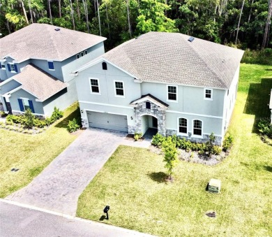 Welcome to this stunning home with Conservation Views in the on Deer Island Country Club in Florida - for sale on GolfHomes.com, golf home, golf lot