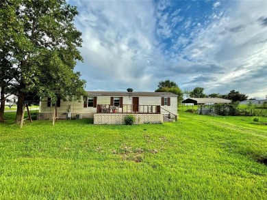 Two-bed, two-bath home situated on three spacious lots in the on Links At Lands End in Texas - for sale on GolfHomes.com, golf home, golf lot