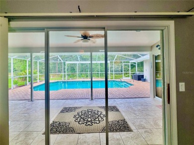 Immaculate 3BR/2.5BA Pool Home in Sugar Mill Woods Oak Village on Sugarmill Woods Golf and Country Club in Florida - for sale on GolfHomes.com, golf home, golf lot