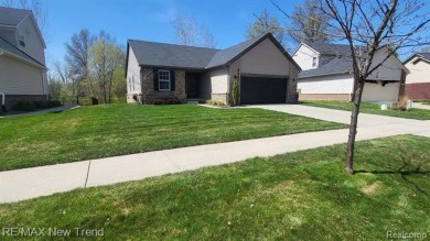 WELCOME HOME!  2017 BUILT RANCH HOME THAT BACKS TO FAIRWAYS AT on Gateway Golf Club in Michigan - for sale on GolfHomes.com, golf home, golf lot