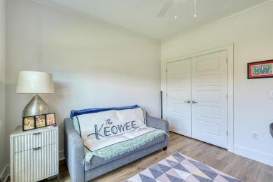 Welcome to this stunning, 4 bedroom/3 bathroom low-maintenance on Woodfin Ridge Golf Club in South Carolina - for sale on GolfHomes.com, golf home, golf lot