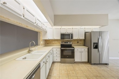 Welcome to your dream home! This spacious 3-bedroom, 2 on East Lake Woodlands Country Club in Florida - for sale on GolfHomes.com, golf home, golf lot