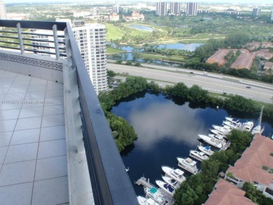 SPECTACULAR CORNER VIEWS: OCEAN GOLF COURT AND MARINAS. THIS IS on Turnberry Isle Resort and Club in Florida - for sale on GolfHomes.com, golf home, golf lot