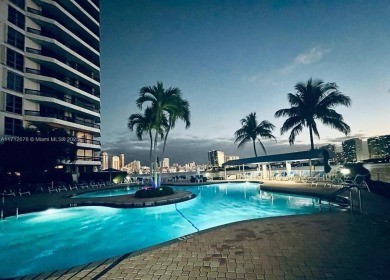 SPECTACULAR CORNER VIEWS: OCEAN GOLF COURT AND MARINAS. THIS IS on Turnberry Isle Resort and Club in Florida - for sale on GolfHomes.com, golf home, golf lot