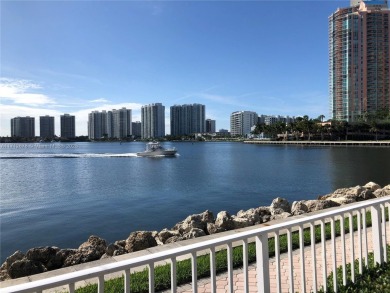 SPECTACULAR CORNER VIEWS: OCEAN GOLF COURT AND MARINAS. THIS IS on Turnberry Isle Resort and Club in Florida - for sale on GolfHomes.com, golf home, golf lot