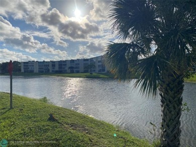 Do not look further! BEAUTIFUL & EXTREMELY WELL MAINTAINED 2 bed on Hillsboro Pines Golf in Florida - for sale on GolfHomes.com, golf home, golf lot