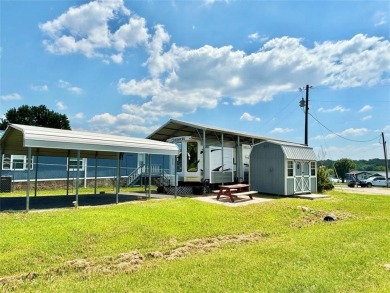 Lake Fork Living. Beautifully Maintained Property on a Corner on Links At Lands End in Texas - for sale on GolfHomes.com, golf home, golf lot