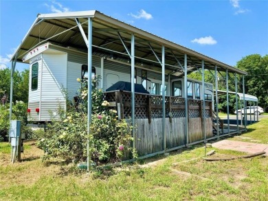 Lake Fork Living. Beautifully Maintained Property on a Corner on Links At Lands End in Texas - for sale on GolfHomes.com, golf home, golf lot