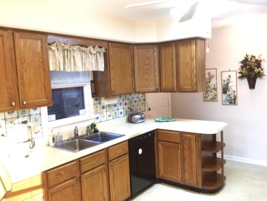 Come live where everyone wants to vacation. This 3 bedroom 2 on Burning Ridge Golf Course in South Carolina - for sale on GolfHomes.com, golf home, golf lot