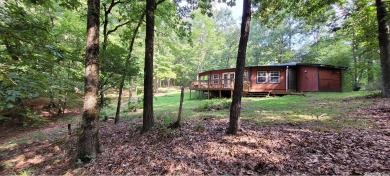 Lake Catherine State Park is your backyard! Investors and DIY'er on Diamondhead Golf and Country Club in Arkansas - for sale on GolfHomes.com, golf home, golf lot