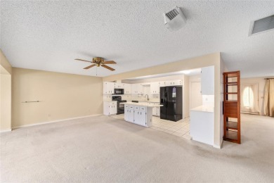 Explore the epitome of active life in this exquisite 2-bedroom on On Top of the World Golf Course in Florida - for sale on GolfHomes.com, golf home, golf lot