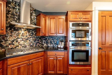 An easy, lock-and-leave home in the heart of the Powder Horn on The Powder Horn Golf Club - Mountain in Wyoming - for sale on GolfHomes.com, golf home, golf lot